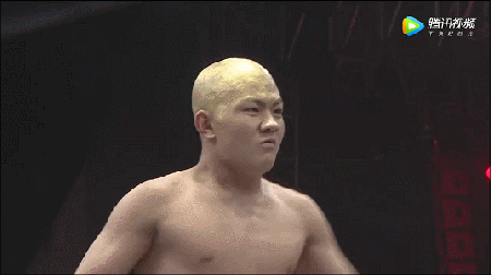 Oriental-Wrestling-Entertainment-OWE-Monk-Little-Vajra-Zhao-Yilong-takes-down-Jack-Manley-with-headbutt.gif